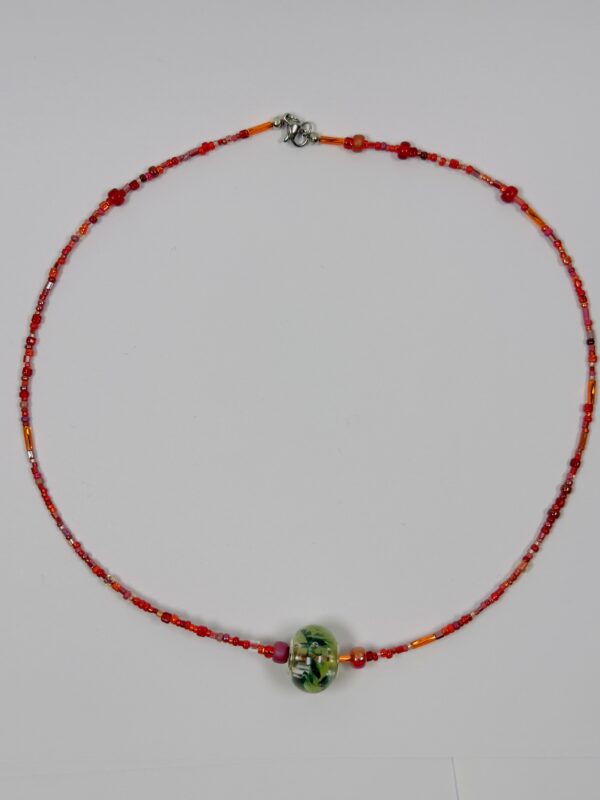 Fiery Red Beaded Necklace with Floral Glass Pendant