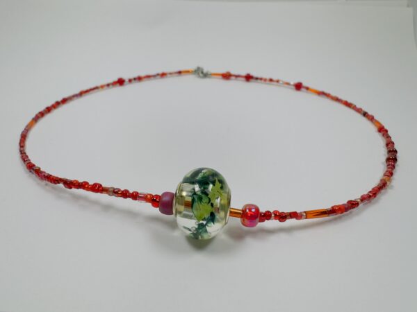 Fiery Red Beaded Necklace with Floral Glass Pendant