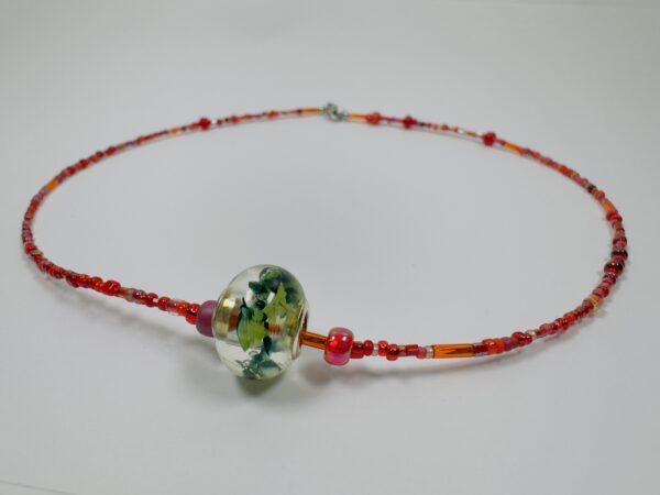 Fiery Red Beaded Necklace with Floral Glass Pendant